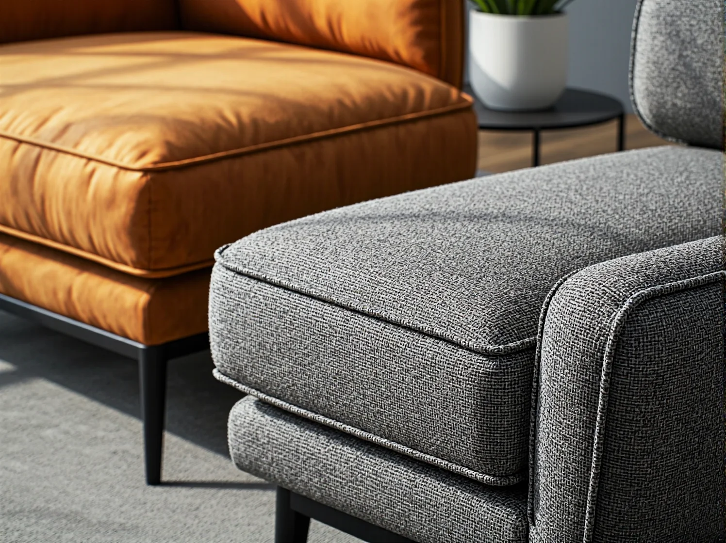 Szary tapicerowany fotel na metalowych nóżkach z miękkim siedziskiem